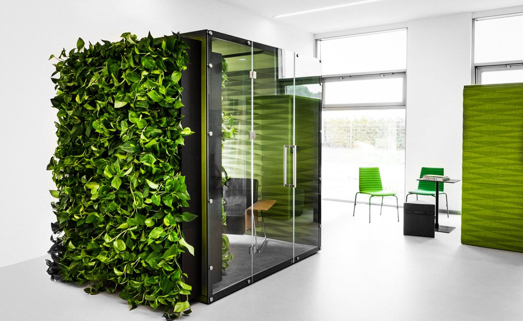 <i>DIAMOND JUNGLE 4-person acoustic&nbsp;office pod&nbsp;with plants on the outer wall</i>